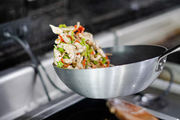 Using Steel Woks to Prepare Chinese Dishes: A Healthier Option